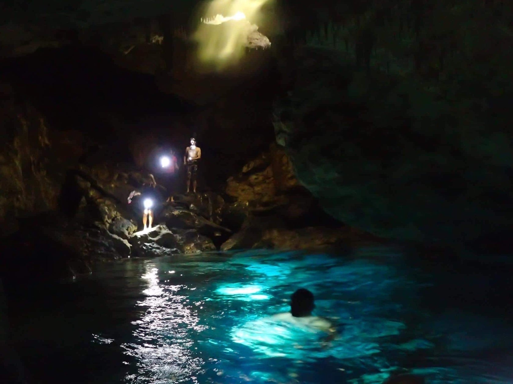 Deep Dive Exploration at Anahulu Cave Pool – Tonga Travel Troupe