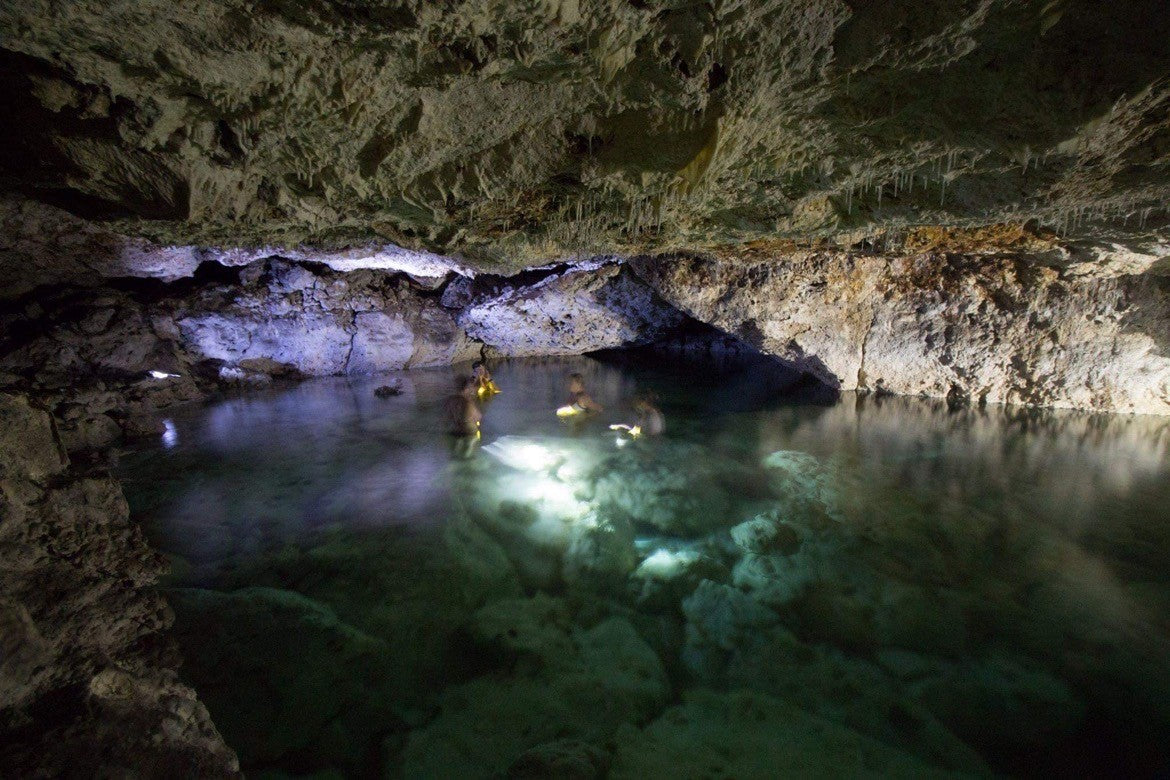 Deep Dive Exploration at Anahulu Cave Pool – Tonga Travel Troupe